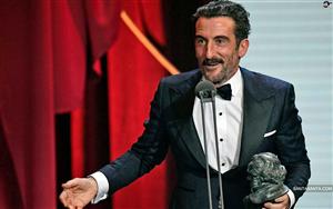 Spanish actor - Luis Zahera poses while receiving the award